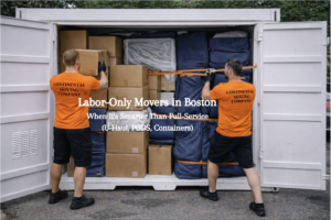 Labor-only movers in Boston loading a moving pod curbside on a tight city street